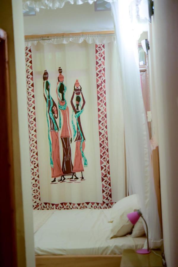 Botanika Hotel Бужумбура Экстерьер фото