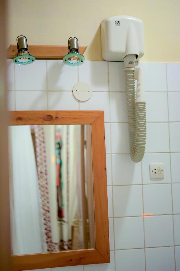 Botanika Hotel Бужумбура Экстерьер фото