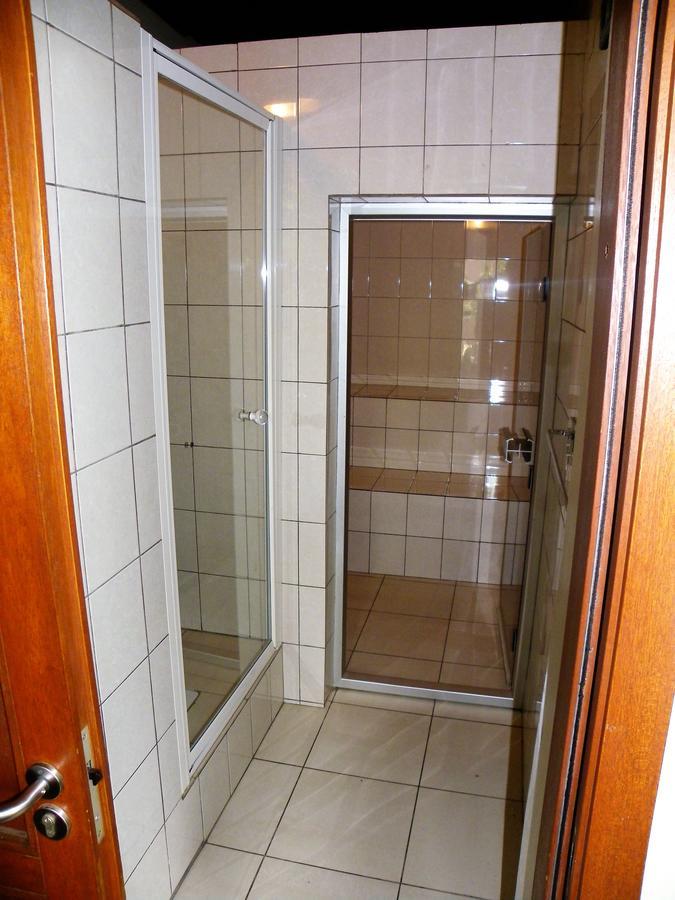 Botanika Hotel Бужумбура Экстерьер фото